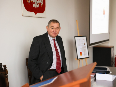 prof.